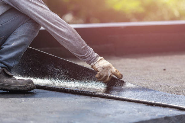 Professional Waterproofing technician working in Erie, KS